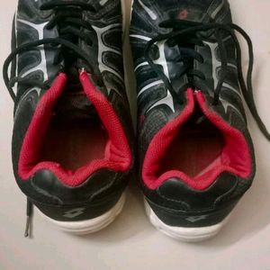 Black And Red Coloured Shoes