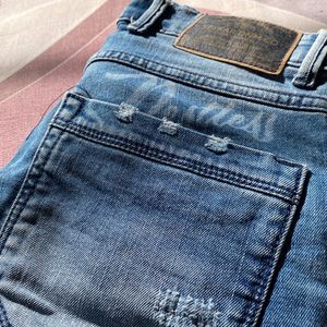 Distressed  Demin Jeans