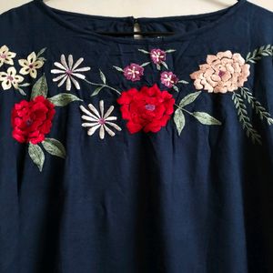 Blue Top With Embroidery On Neck