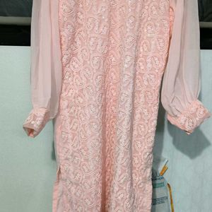 This pink colored georgette Plazo Suit