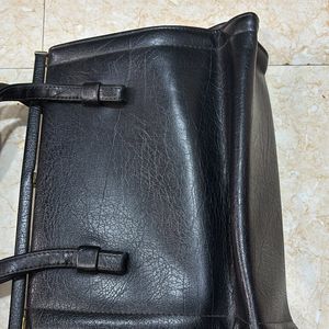 Thrifted Leather Hand Purse