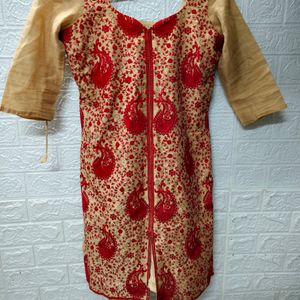 Golden Kurti With Red Embroidery