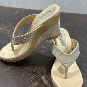 Khadim’s Golden Shimmery Wedges