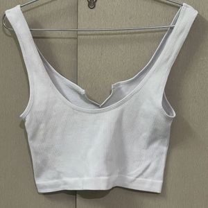 White sleeveless crop