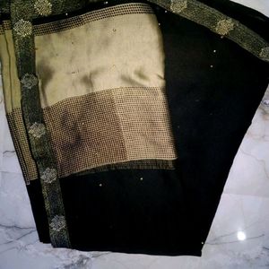 pretty olive black saree.