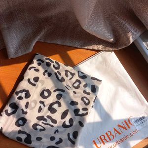 BRAND NEW URBANIC top with White Leopard Print.