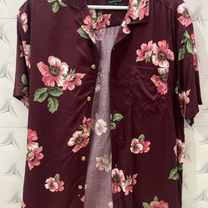 Floral shirt.