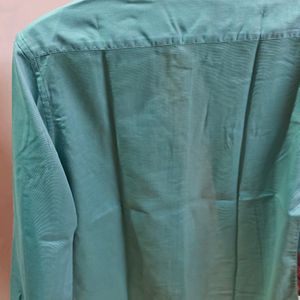 Its A Light Turquoise Colour Shirt From Perri Alley Brand With pakka Condition