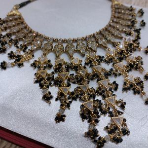 Golden And Black Necklace