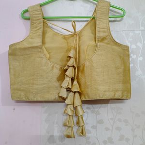 Golden Sleeveless Blouse