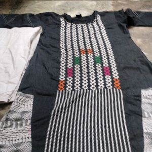 Black Kurti white Patiala Pant.