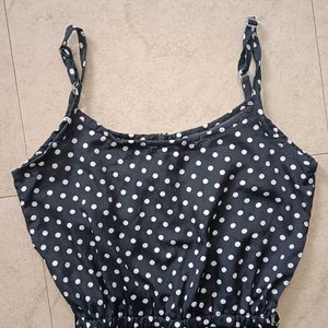 A Black Polka Dot Jumpsuit