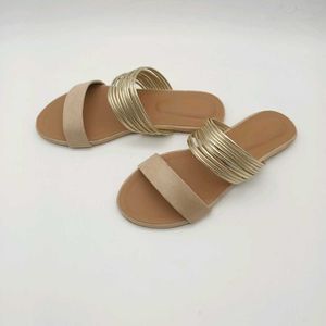 Tan And Gold Flat Sandals.