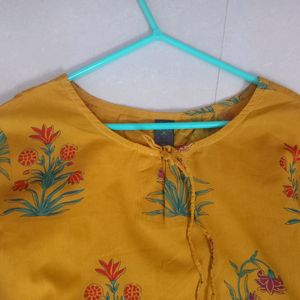 YELLOW SHORT KURTI WITH BELL SLEEVES