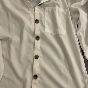 White Buttoned Puff Sleeved Shirt