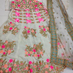 Heavy Embroidery Cream Colour Lehenga Choli