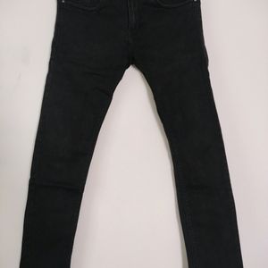 Black Slim Fit Mid Rise Denim Jeans For Men