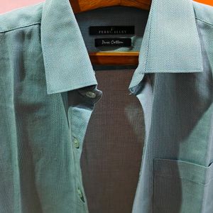 Its A Light Turquoise Colour Shirt From Perri Alley Brand With pakka Condition