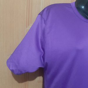 NIKE AIR PURPLE ACTIVE WEAR TSHIRT.