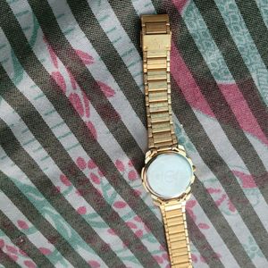 Titan Watch Good Condition golden Colour