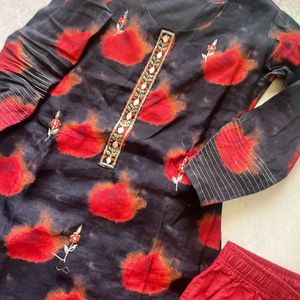 Black and red heavy kurti with go colours pants