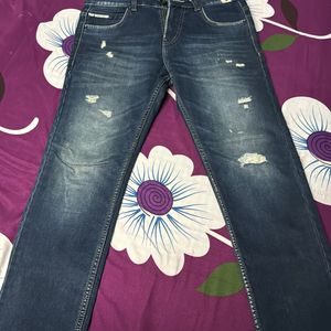 Distressed Denim Jeans