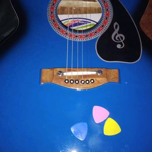 Guitar with Bag, Strings and 2 Picks