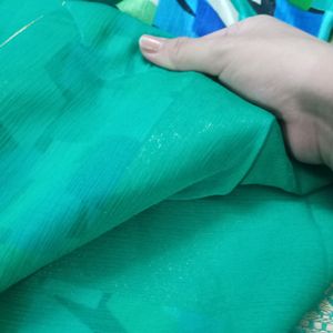 "Elegant Green  Saree with Vibrant Mosaic Blouse