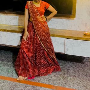 net golden and red lahenga