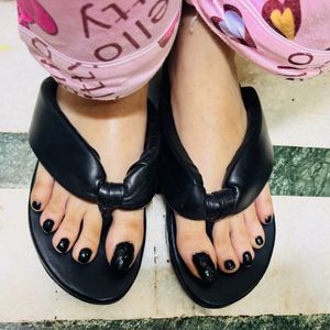 Black quilted strap flatforms