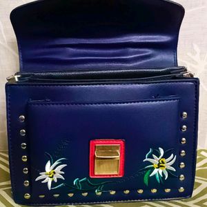 Women Solid Handbag With Beautiful Embroidery Work