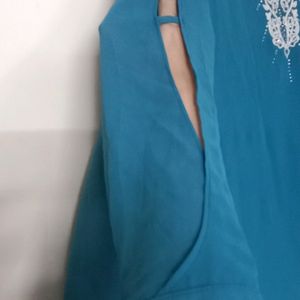 New Teal Tunic, pattern sleeves white embroidery