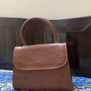 Brown Purse And Sling Bag