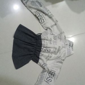 A Elegant "Newspaper" Top