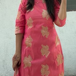 A Bright Pink Kurta With Neck Design