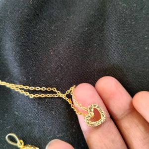 Two Neckchains With 3 Lockets