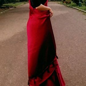 HOT RED SATIN SAREE WITH BLACK VELVET BLOUSE .