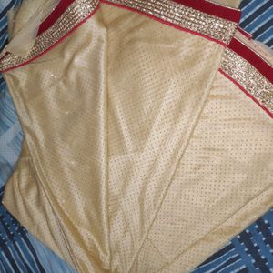 pretty red golden saree.