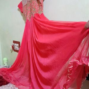 Heavy Stone Work With Embroidered Ethinic Net Gown