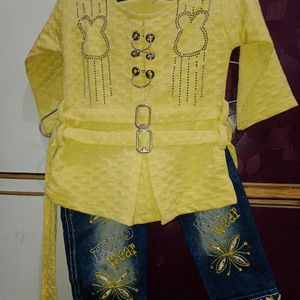 Denim Jeans With Yellow Top.