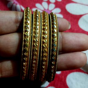 Set Of Four Gold Plated Bangles