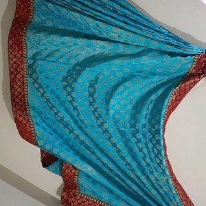 Banarasi SkyBlue Maroon And Gold With Stone Saree