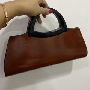 Brown Handheld Clutch