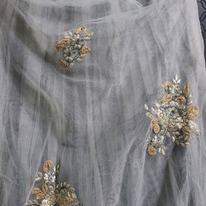 Grey Lehnga And  Padded Choli Full Net Work Lehnga 3 Layer Of Net With Good Look And Simple Matching Greay Duppta