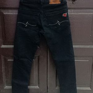 A Black Coloured Solid Casual Jeans