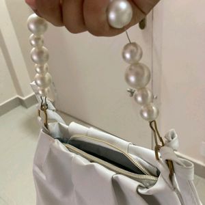 White pearl handbag