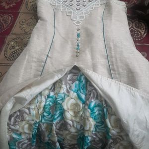 long embroided choli with plates skirt