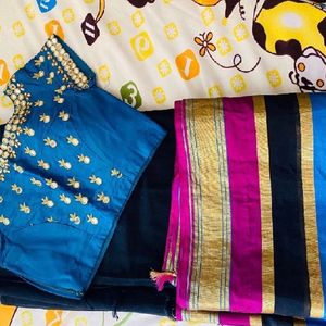 Blue Work Blouse And Black Saree