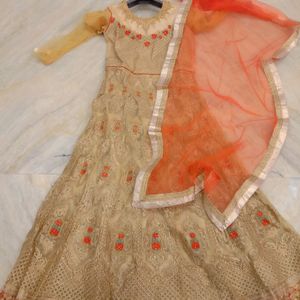 party wear golden and orange gown