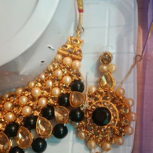 Very Gorgeous Golden And Black Color  Necklace With Earrings And Mangtika